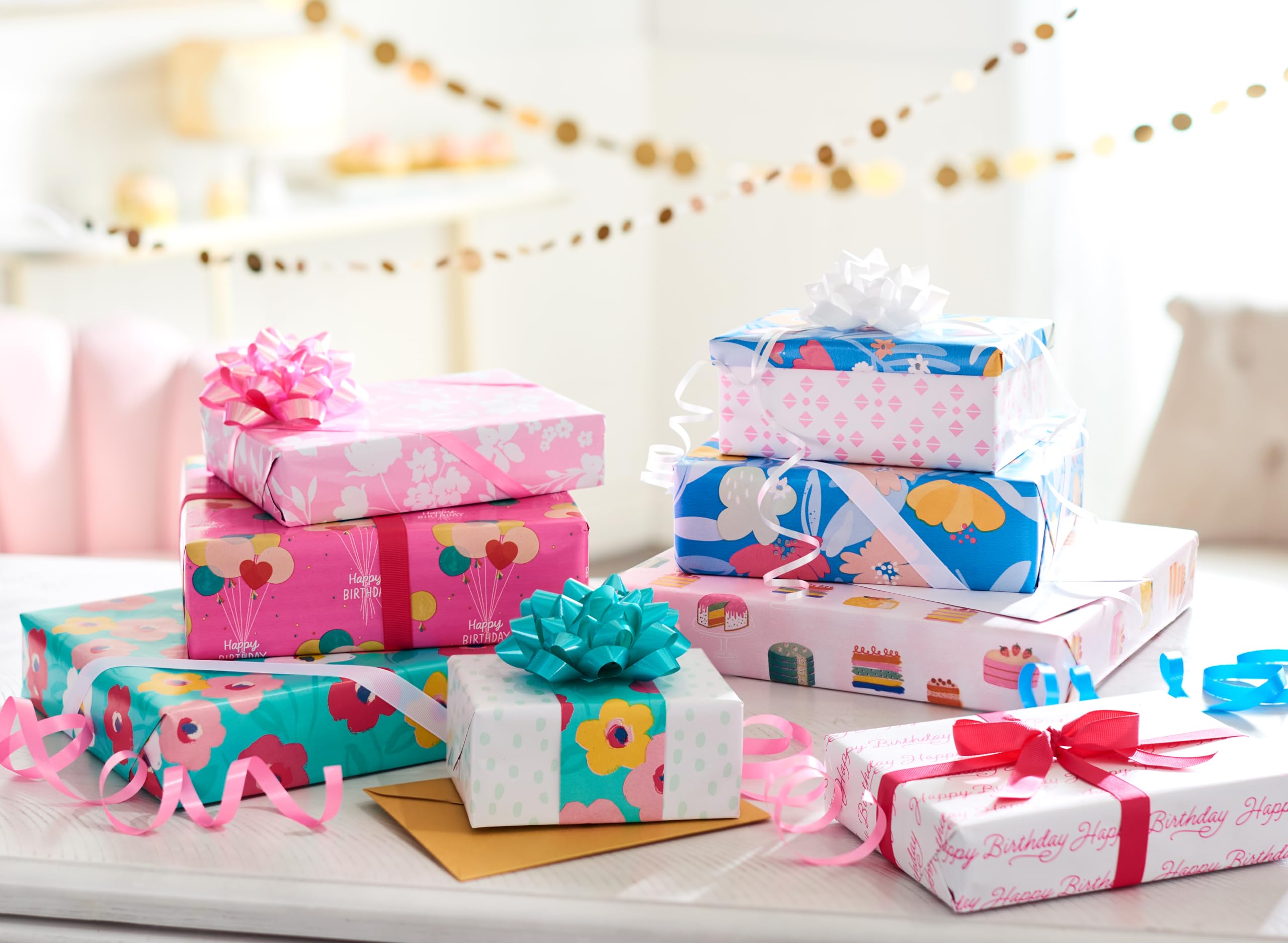 American Greetings 160 sq. ft. Reversible Wrapping Paper Bundle for Birthdays and All Occasions, Floral and Happy Birthday Text (4 Rolls, 30 in. x 16 ft.) - Image 8