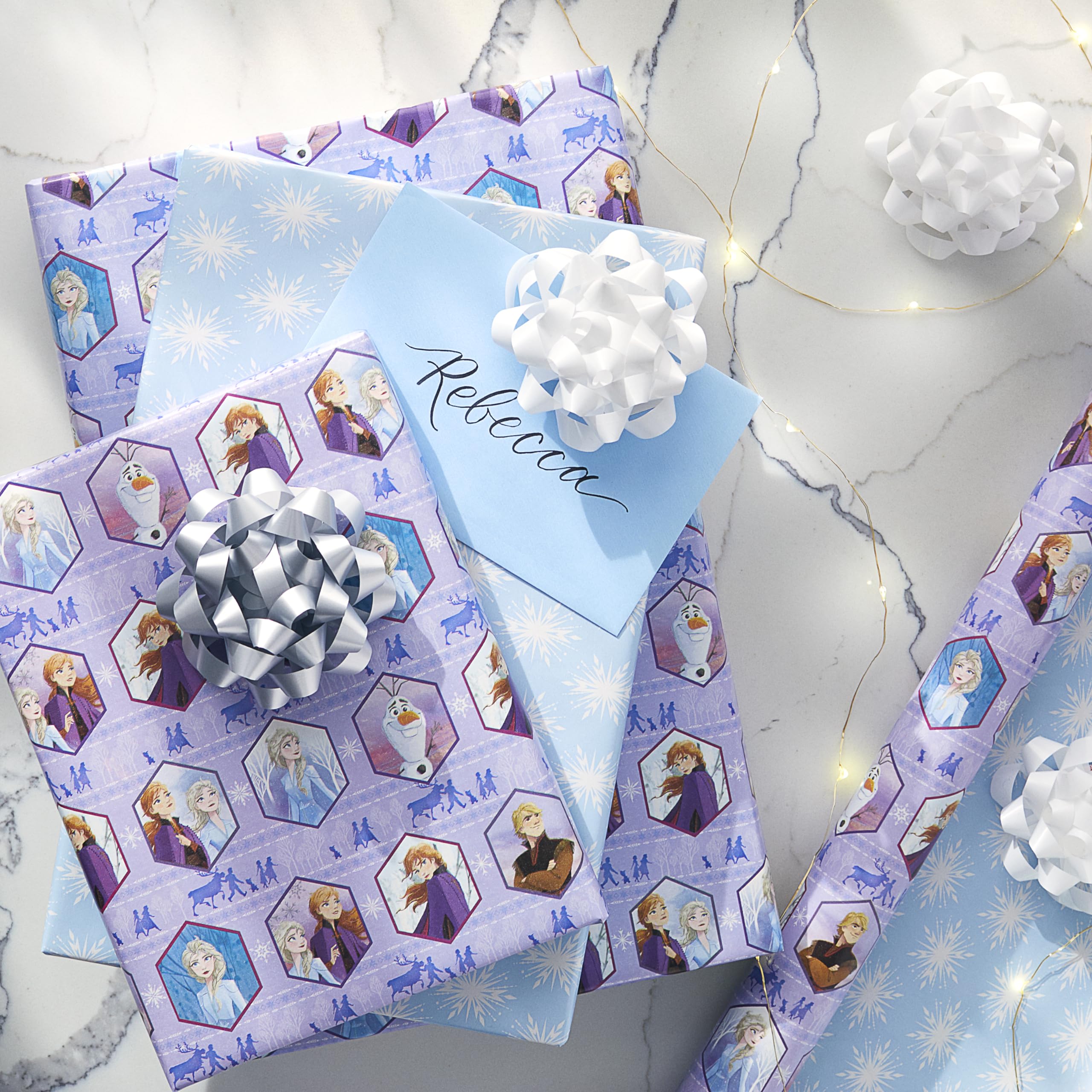 American Greetings Disney Frozen Wrapping Paper Roll for Christmas, Birthdays, or Any Occasion, Elsa and Anna Holiday Gift Wrap (75 sq. ft., 1 Reversible Roll) Light Blue and Purple, Olaf, Kristoff - Image 6